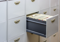 What is the difference between fireproof and fire-resistant file cabinets?